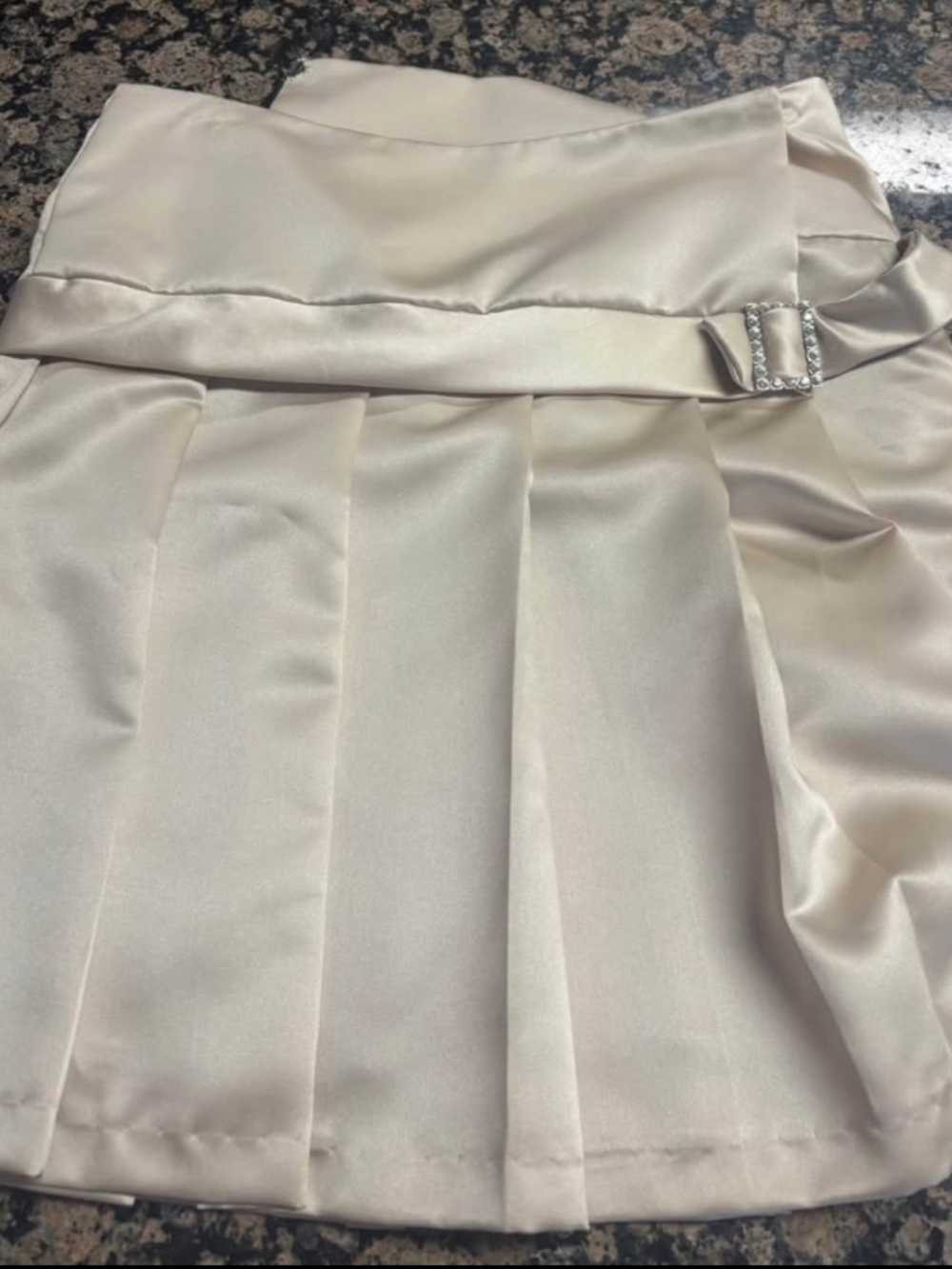 Saturn formal pleated skirt with rhinestone buckle